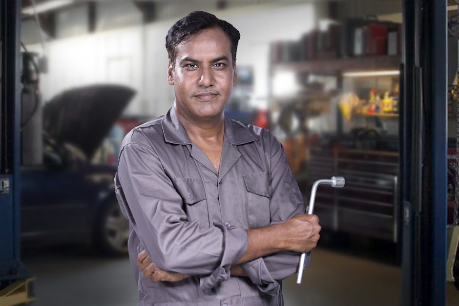 Smiling auto mechanic